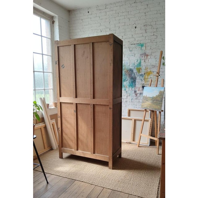 Vintage French Parisian Armoire in Beechwood and Cane, 1950, in Very Good conditions. Designed 1950 to 1959 This piece has...