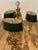 Handsome Lightolier polished brass bouillotte style chandelier having 3 arms with dark green tole shades. (Nobbs)