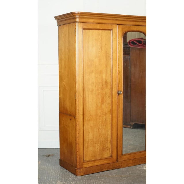 Late Antique Victorian Oak Triple Wardrobe made by Marsh Jones & Cribb circa 1890. A stunning piece of furniture that...
