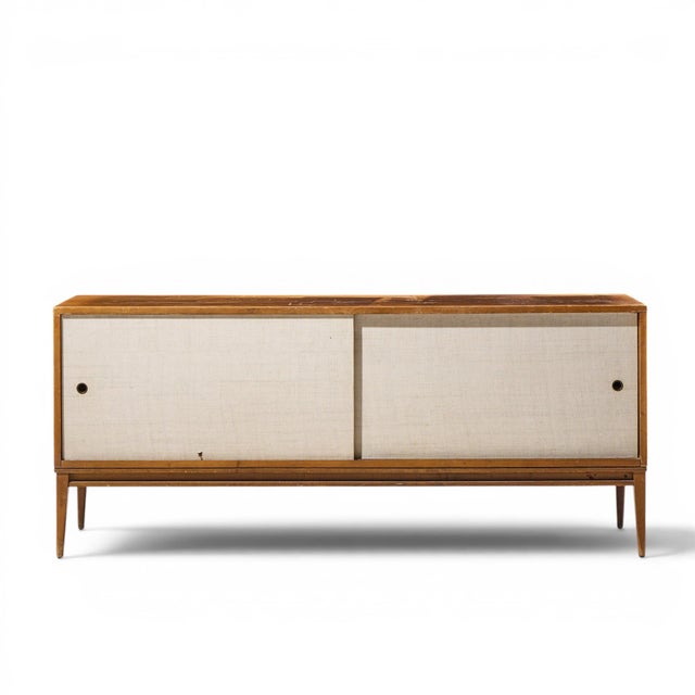 Paul McCobb for Planner Group Mid Century Sliding Door Credenza This credenza measures: 60 wide x 18 deep x 25.75 inches...