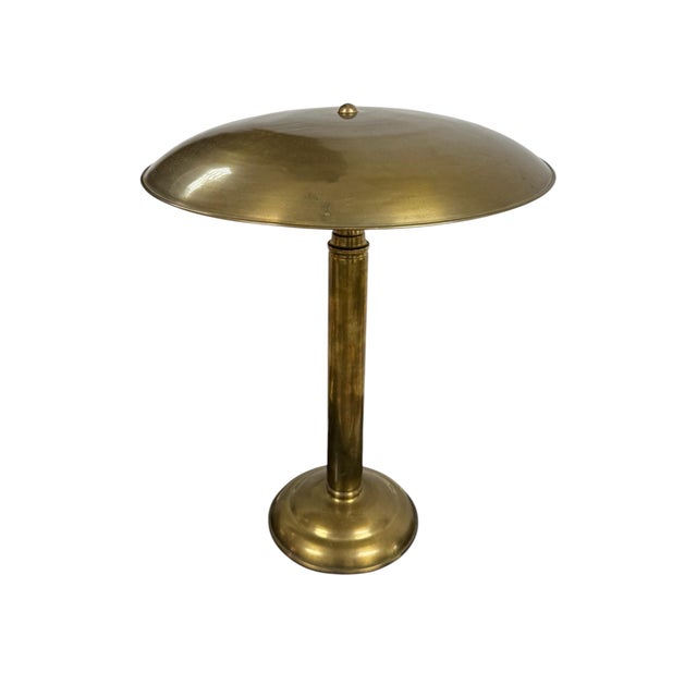 Art Deco table lamp, Europe 1930s. Brass body and shade, two bakelite e14 lights. Cleaned and mildly polished, light wear...