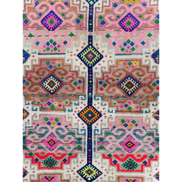 This mid-20th-century Turkish Anatolian wide gallery runner presents a vibrant, highly structured composition across a...