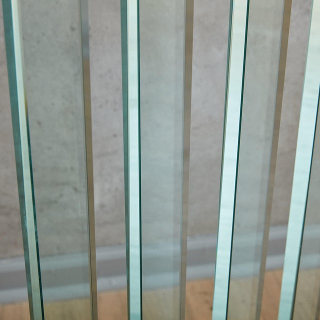 A rare Postmodern cut glass coat hanger designed by Italian glassmaker FIAM in the 1970s. This sculptural piece is...