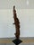 Stylish Arteriors Organic Modern Natural Teak Kazu Sculpture, black metal stand. Showroom floor sample.