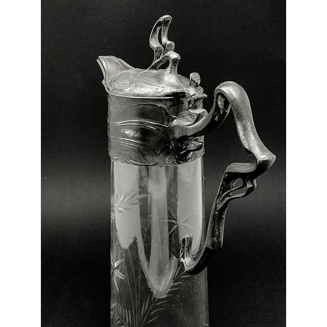 The jug was created at the PWQE factory, around 1900-1910. Its condition is very good. The presented jug is an example of...