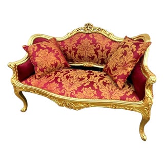 French Baroque Style Settee – Red Damask Upholstery With Hand-Applied Gold Leaf Frame For Sale