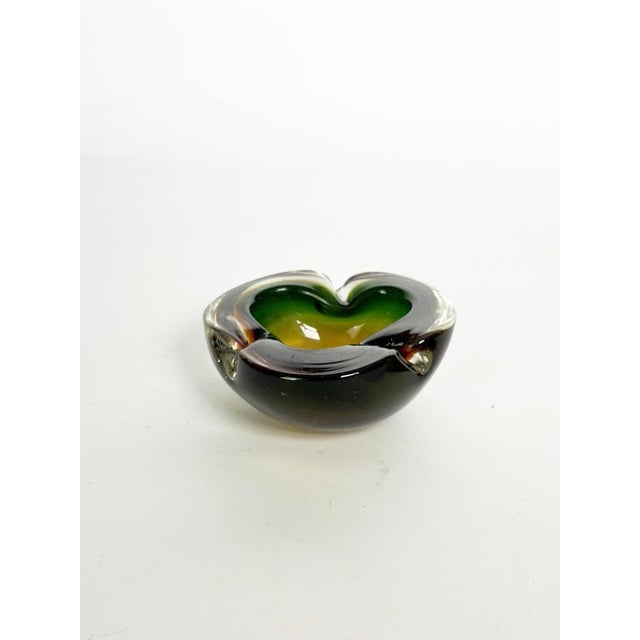 Thick, two-tone glass ashtray, France, 1960s. An elegant, thick, molded glass ashtray featuring a striking color gradient...