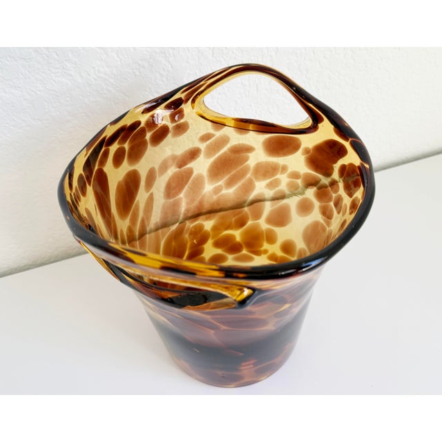 Produced in the 1960s as part of the Dior Home Collection, we present this exquisite blown glass champagne/wine bottle...