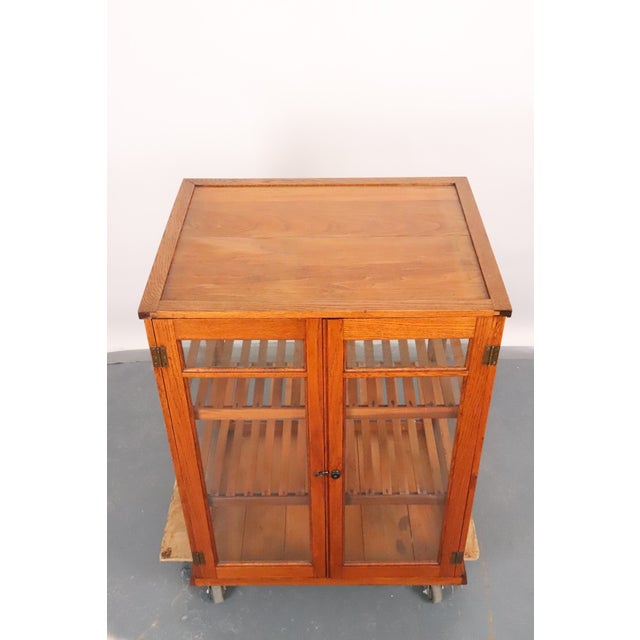 Antique countertop country store pie and bakery display case made of quarter sawn oak with the original glass front and...