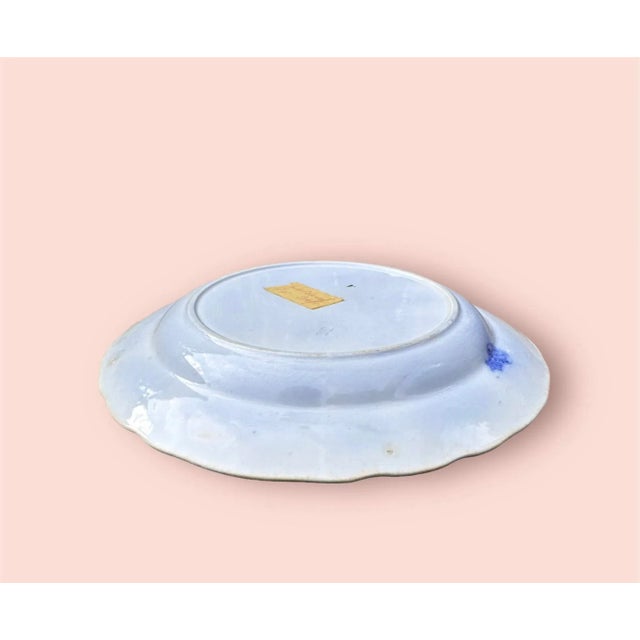 Offering an 8” salad or dessert plate produced in England. English Ceramic transfer-ware of the popular blue onion...
