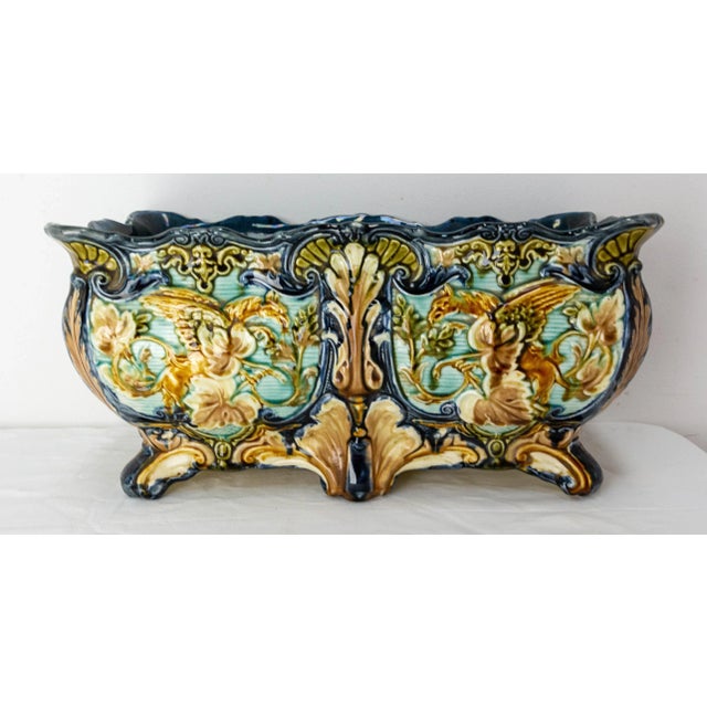 French square jardiniere with griffins and vegetal decoration, circa 1900. Art nouveau Very good condition.
