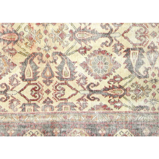 1930s Persian Mahal Rug. Hand woven in the Mahal region of Iran. Distressed and refinished in the U.S. These intricately...