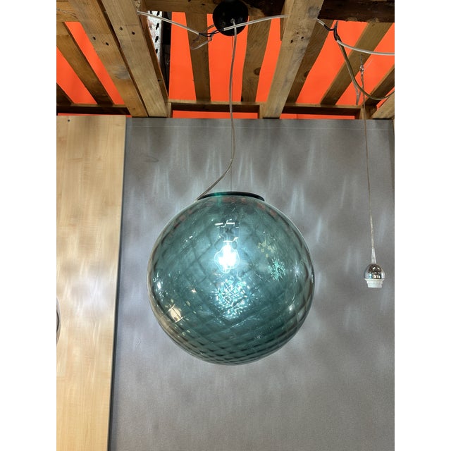 Contemporary Murano balloton green ' color chandelier pendant Metal frame in chrome. A luxury piece of art for...