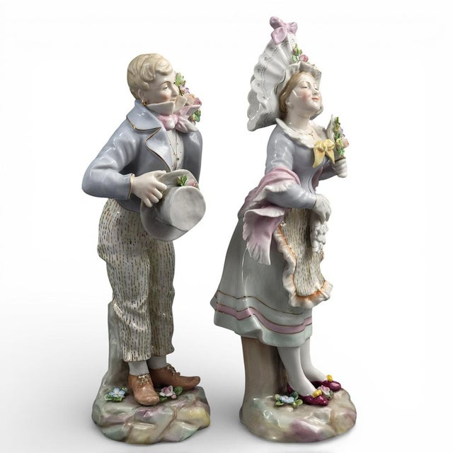 A finely executed pair of German porcelain figures depicting a galant subject. Produced by Älteste Volkstedter...