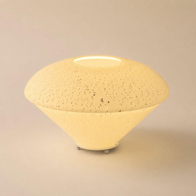 Elegant Italian table lamp from the 1970s, designed in the decorative spirit often associated with Carlo Nason for...