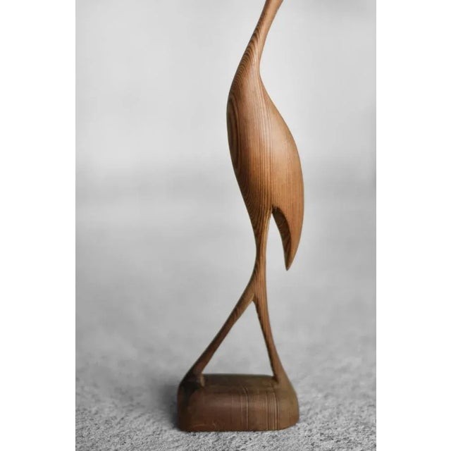 This wooden Crane figurine was produced in Denmark during the 1960s. Hand-made of high-quality smoothly sanded wood with...