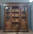 A substantial louis xiii style solid oak bookcase, dating from the 19th century. this generously sized piece is...