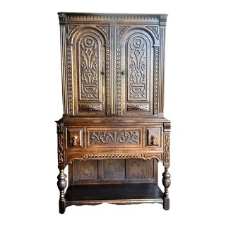 Antique Spanish Revival Liquor Cabinet or Linen Press in Carved Fumed Oak and Burlwood - Early 20th Century For Sale