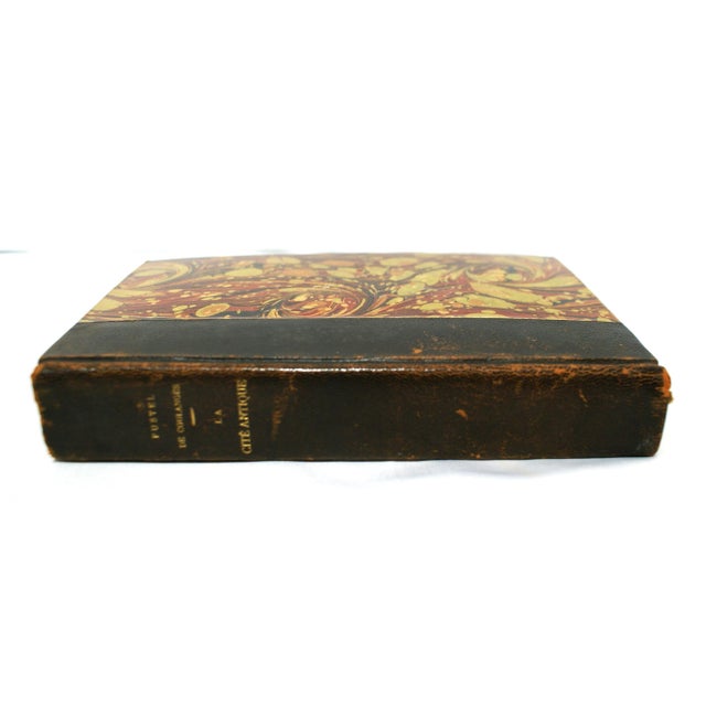 Wonderful old French decorative leather book for staging your shelves or great for table display. Black leather with multi...