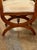 The 19th Century German Walnut Biedermeier Bench is a stunning antique piece of furniture that exudes elegance and charm....