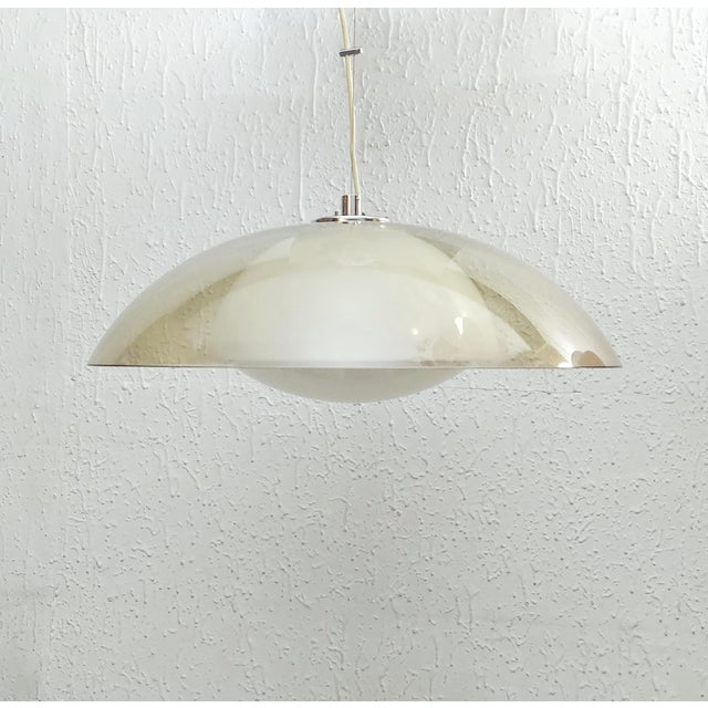 Design: Guzzini's in-house design team led by Luigi Massoni Manufactured by: Meblo from Nova Gorica, Slovenia in the...