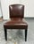Design Plus Gallery presents a Leather Side Chair from Marco Furniture. The chair has brown leather upholstery, an arched...