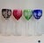 4 jewel tone crystal goblets cut to clear in American brilliant style. detailed stems and base. heavy. one very small flaw...