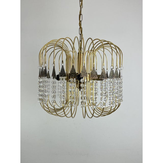 Murano glass chandelier "Millefili" Italian design from the 70s. Diameter 45 cm, height 40 cm (105 cm with the chain)....