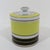 Streamline style porcelain lidded jar by Mottahedeh, with bright lemon yellow bands and black, white and gold decoration....