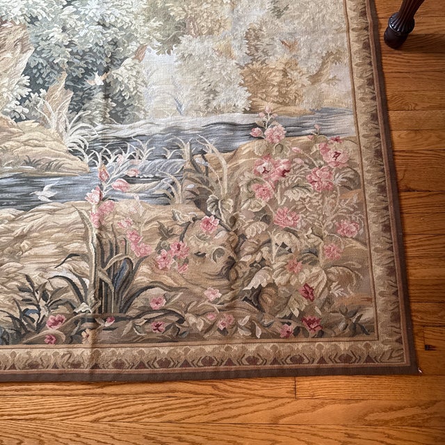 This is a lovely very large vintage wool tapestry by Ethan Allen. It depicts a creek surrounded by trees and foliage with...
