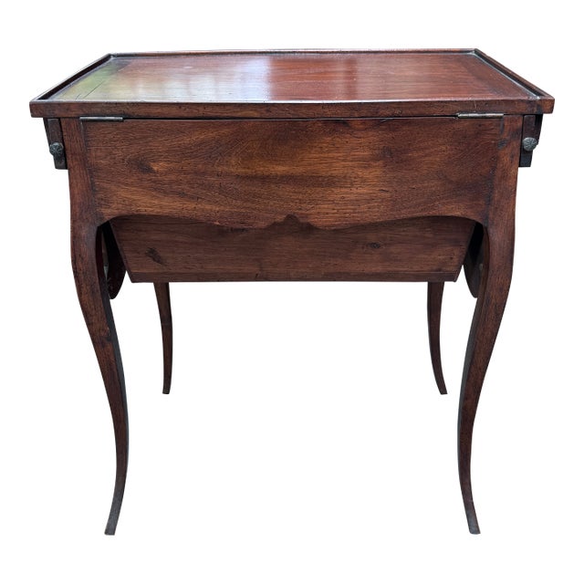 Petite French Provincial fruitwood secrétaire with curved back, integrated storage, and original hardware. Unlike...