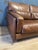 Beautiful buffalo leather 2-seater sofa. Features a stunning patina and a comfortable seat. The sofa is made of buffalo...