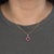 Elevate your jewelry collection with this stunning 1.9 carat Madagascar ruby pendant, celebrated for its deep crimson hue...