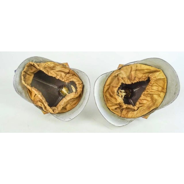 A lovely pair of decorative Prussian helmets Compliment the most eclectic decor Perfect for the study or library