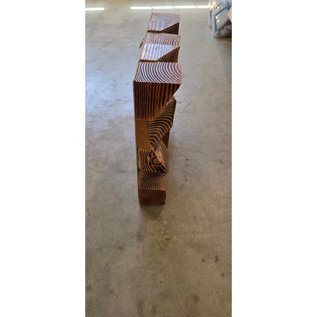 Each block is 15" x 15" wood lightly torched to bring out the wood grain. There are 4 blocks per set.