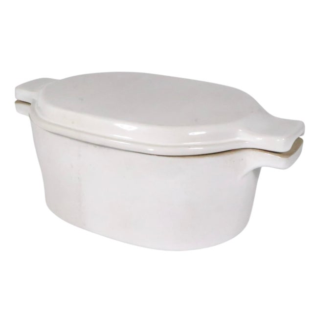 David Gil for Bennington Potters covered casserole, baker dish in off white glaze. This example is in excellent, original,...
