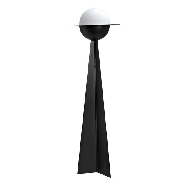 This elegant metal floor lamp has been expertly artisan crafted and finished in matte black. This lamp is a dazzling...