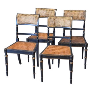 Set of Four Diminutive English Regency Ebonized and Caned Side Chairs For Sale