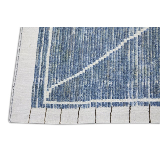 Introducing our exquisite handwoven wool modern Moroccan-style rug, a stunning blend of traditional craftsmanship and...