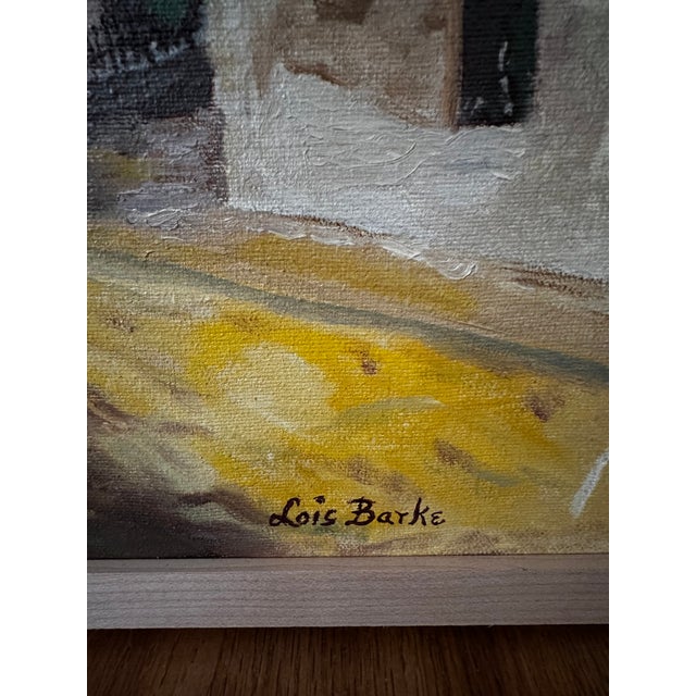This lovely little acrylic painting on canvas depicts a street scene of buildings assumably in France. It is signed Lois...