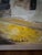 This lovely little acrylic painting on canvas depicts a street scene of buildings assumably in France. It is signed Lois...