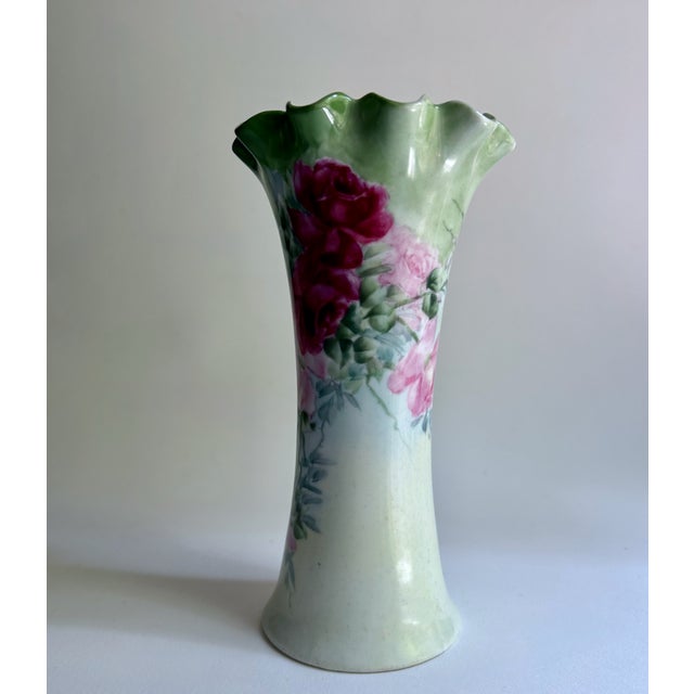 Early 1900’s Leonard Vienna, Austria hand painted soft Melon Green and Pink Roses Flared Vase. Featuring a flared gradated...