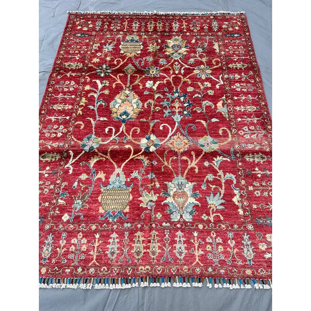 A finely hand-knotted Afghan Chobi Ziegler rug in the classic Sultanabad vase design — larger-than-life palmettes,...
