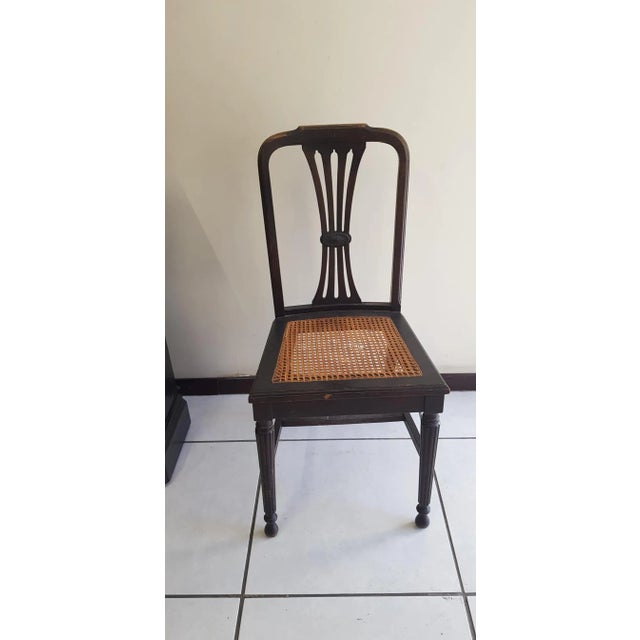 Eclectic style chair early 20th century solid wood with carving. Perfect for a rustic style kitchen.