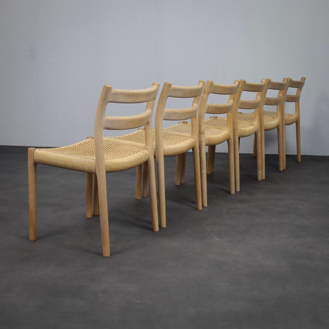 A beautiful set of 6 dining chairs designed by niels otto møller and produced by j.l. Møllers møbelfabrik. Model 84 is...