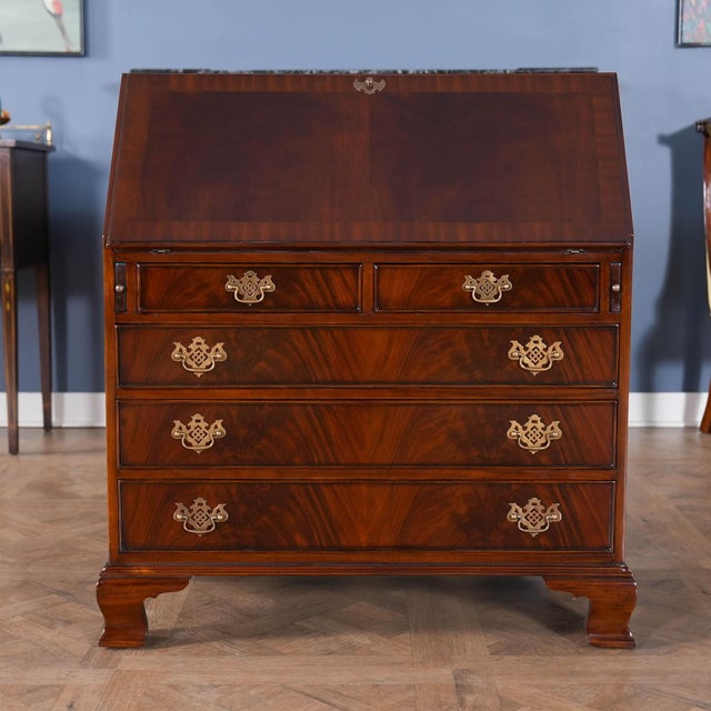 This Mahogany Secretary Desk from Niagara Furniture has all the outstanding qualities of an antique original. Made of...