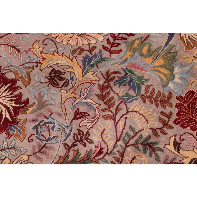 Designed with mesmerizing intricacy and gorgeous color palette, this hand-knotted masterpiece demonstrates the beauty and...