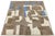 Handwoven in wool, this modern Moroccan-style rug features an abstract composition of earthy browns, off-white, and...