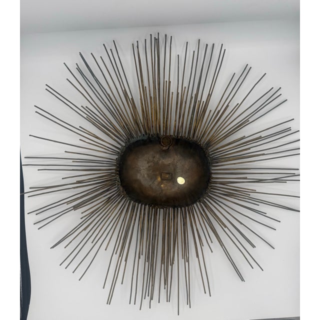 This item is a rare Mexican Mid-Century Modern sun sculpture crafted by Emaus Talleres Monasticos. It features a bronze...