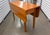 An 18th-century George III mahogany drop-leaf gate leg table is a masterpiece of classic British Cabinetry, balancing...
